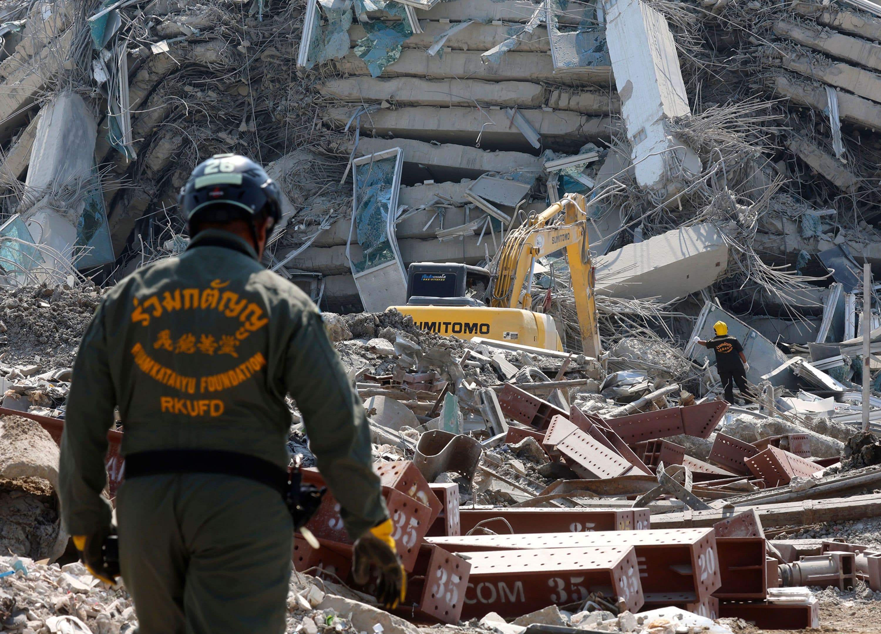 Rescue workers search for survivors at the site of the collapsed skyscraper in Bangkok’s Chatuchak area on March 28, 2025. (Sakchai Lalit/AP)